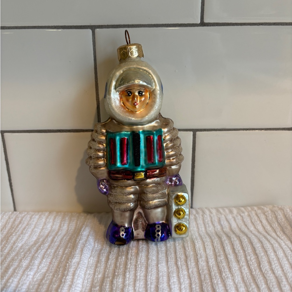Vintage 1990’s Christopher Radko Rocketman ornament.